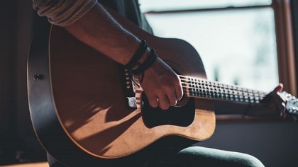 Play the guitar