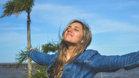 a woman is very happy