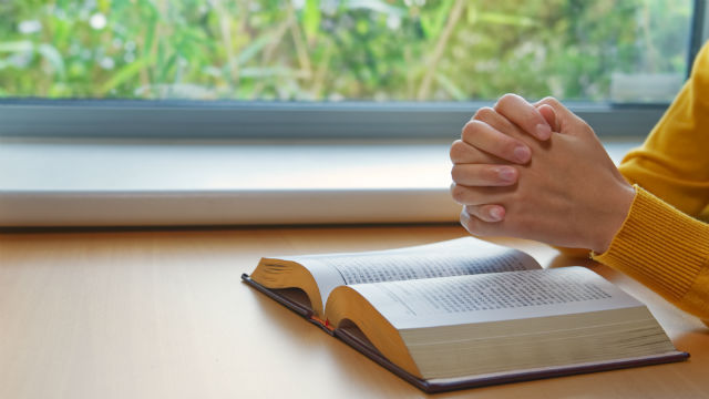 a Christian praying to God