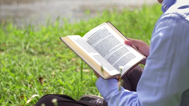 A Christian is reading the Word of God