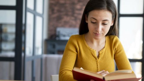 A woman reading the Bible