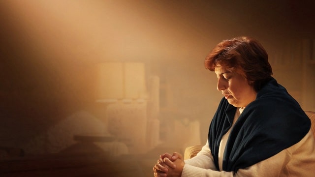 A Christian praying to God